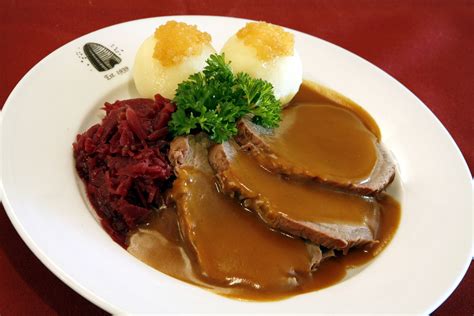 Rheinischer Sauerbraten: Experience the Tangy Delight of Slow-Braised Beef Immersed in a Sweet and Sour Symphony!